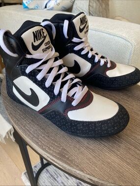 Nike Black & White High-Top Sneakers with Red Stitching